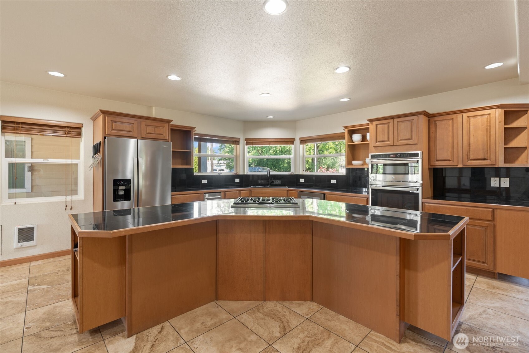 802 State Street Centralia, WA 98531 - Photo 11 of 40 a kitchen with stainless steel appliances granite countertop a refrigerator a stove and a sink