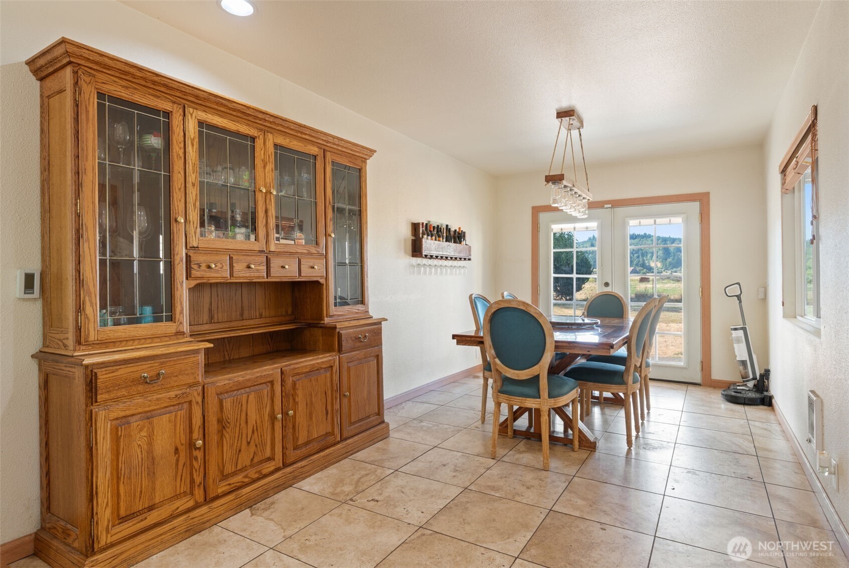 802 State Street Centralia, WA 98531 - Photo 15 of 40 a view of a dining room with furniture and chandelier