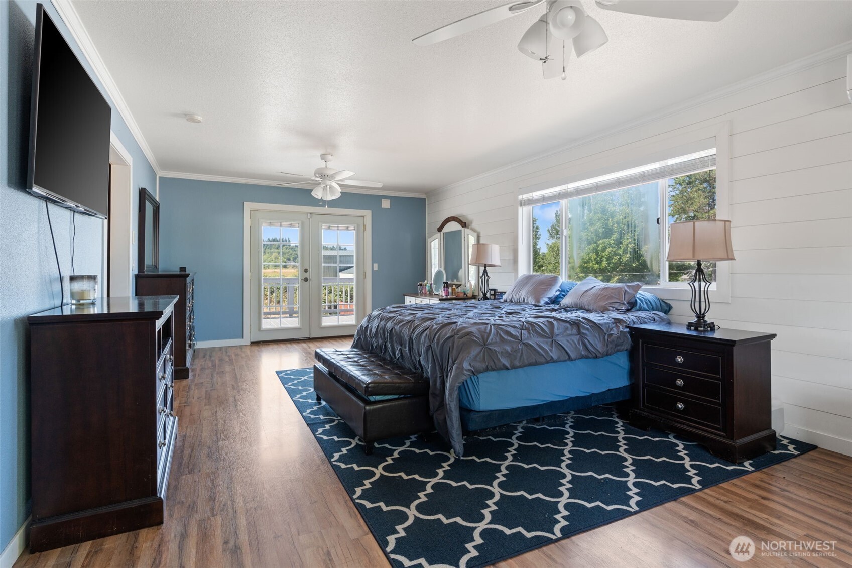 802 State Street Centralia, WA 98531 - Photo 24 of 40 a bedroom with a bed and wooden floor