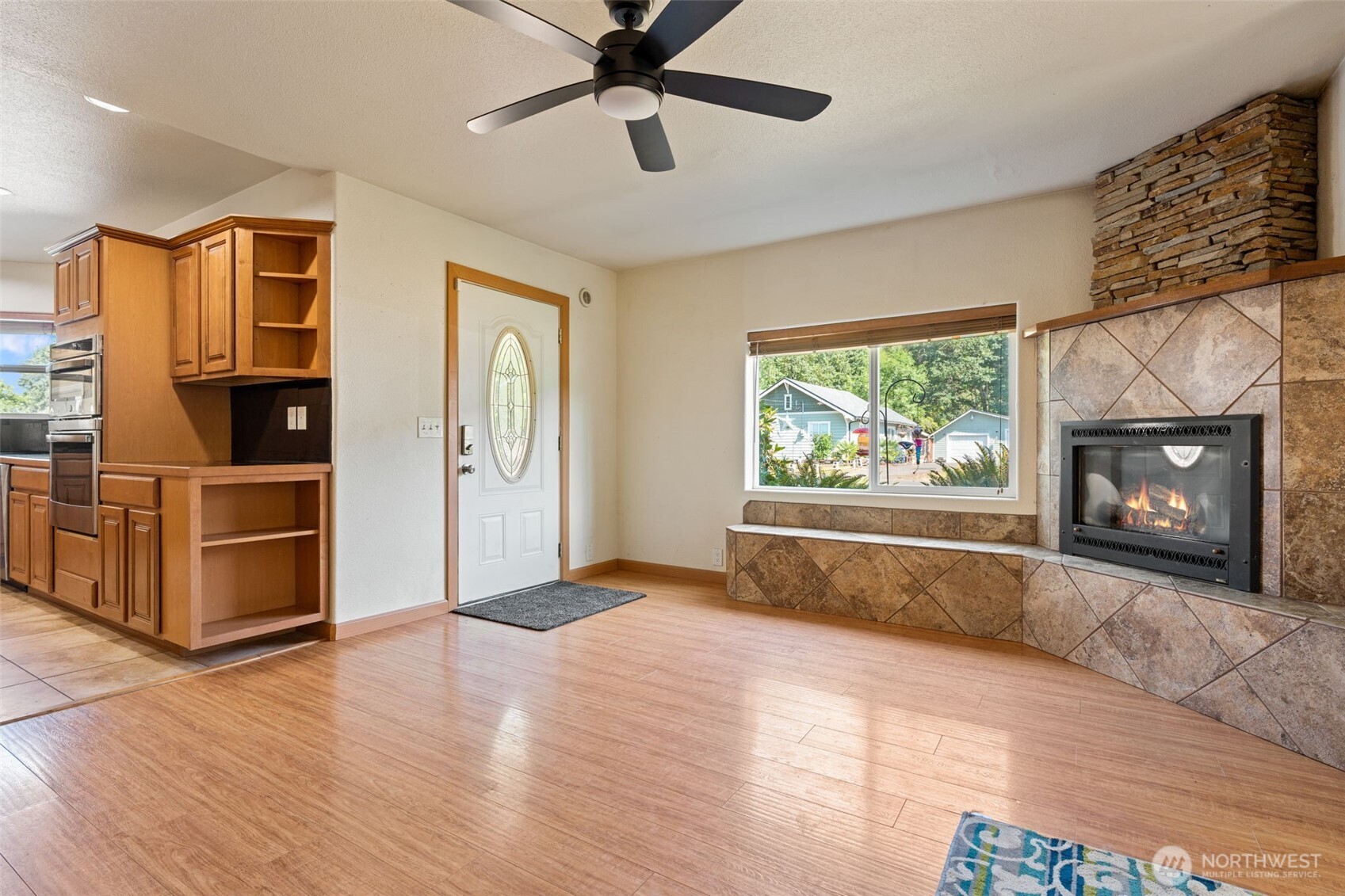 802 State Street Centralia, WA 98531 - Photo 6 of 40 a view of an empty room with window and wooden floor