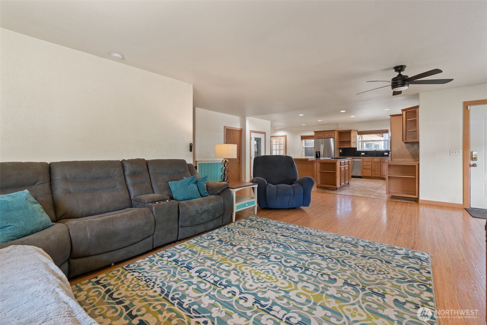 802 State Street Centralia, WA 98531 - Photo 9 of 40 a living room with furniture and a wooden floor