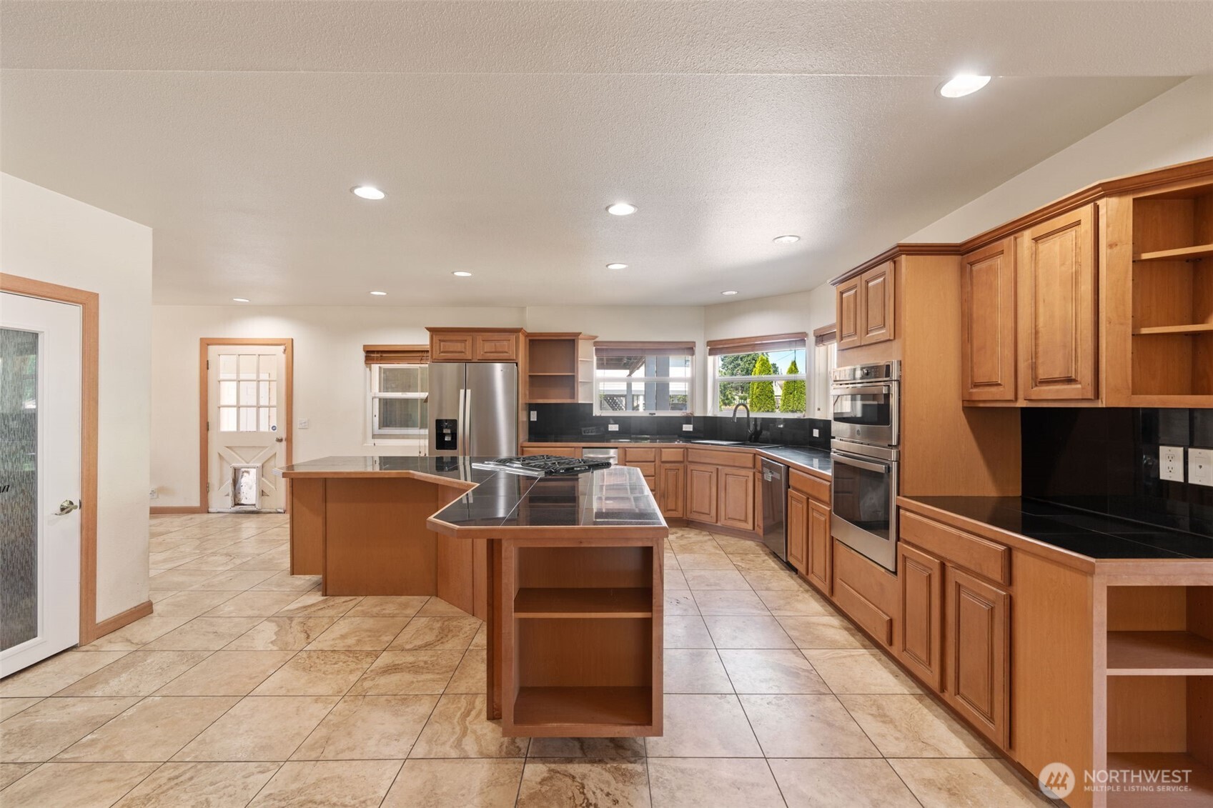 802 State Street Centralia, WA 98531 - Photo 10 of 40 a kitchen with stainless steel appliances lots of counter top space cabinets and furniture