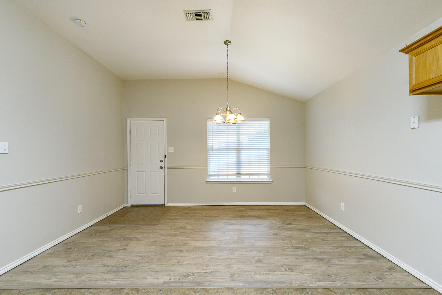 6520 92nd Street Lubbock, TX 79424 - Photo 18 of 30 a view of an empty room with a window