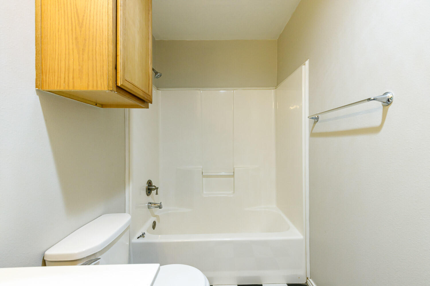 6520 92nd Street Lubbock, TX 79424 - Photo 25 of 30 a bathroom with a toilet and a bathtub