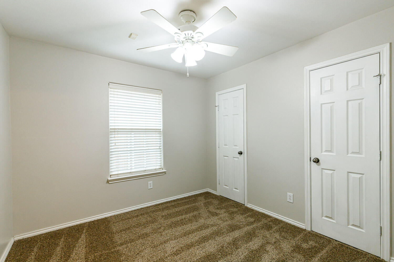 6520 92nd Street Lubbock, TX 79424 - Photo 27 of 30 a view of an empty room with a window