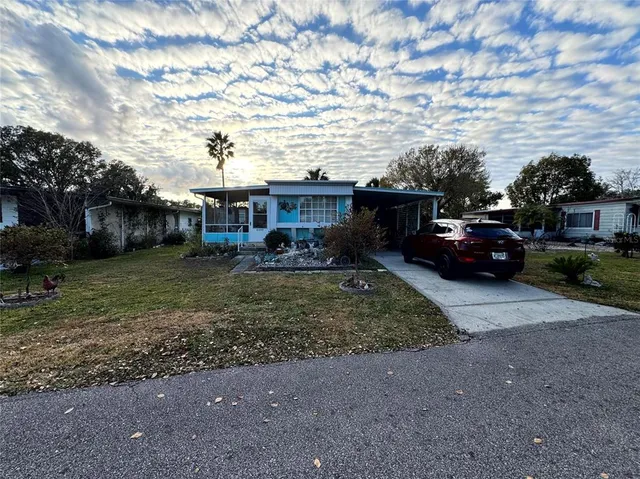 a car parked in front of a house