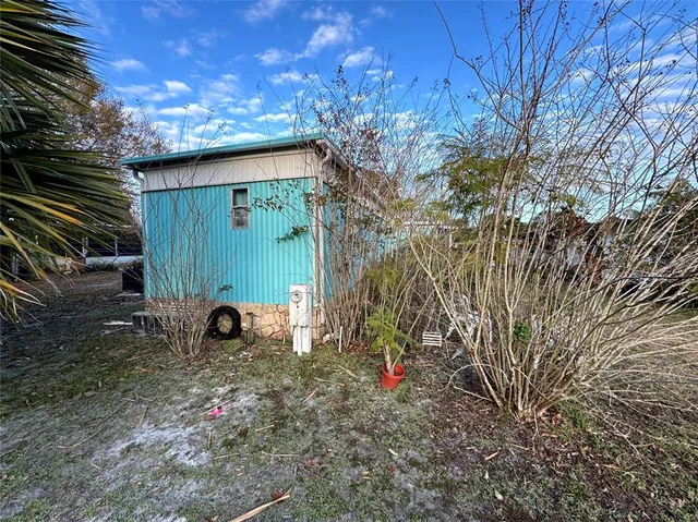 a view of backyard with green space