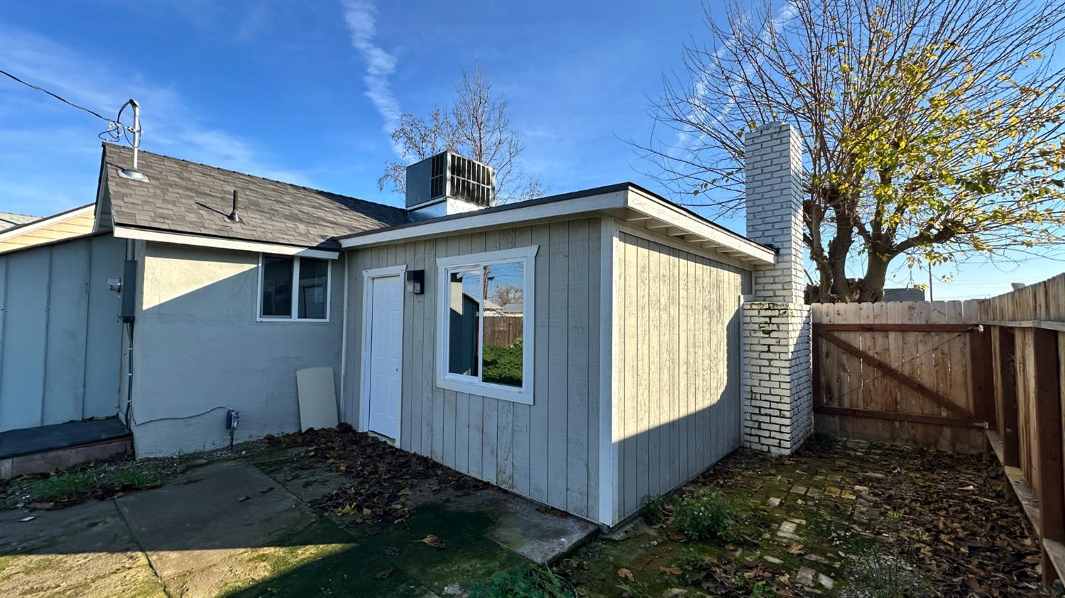 749 East Pleasant Street Coalinga, CA 93210 - Photo 12 of 16 a view of a house with a yard