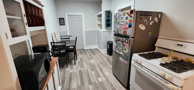 a room with furniture and wooden floor