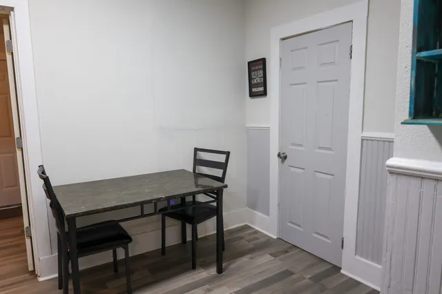 a kitchen with a sink stove and microwave