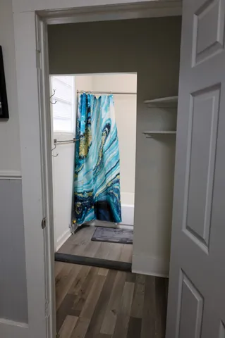a kitchen with a sink cabinets and utility
