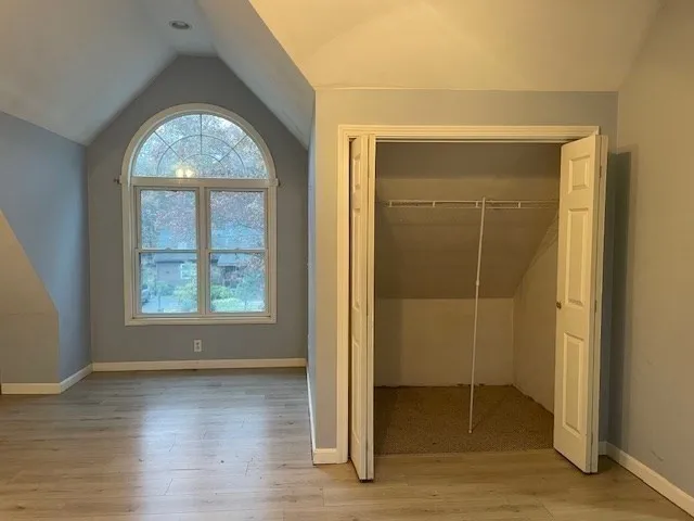an empty room that has a window