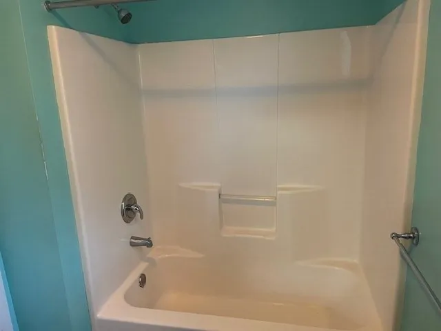 a bathroom with a bathtub