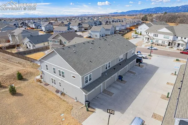 an aerial view of a house with a outdoor space