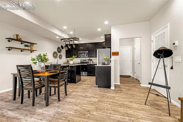 a view of a dining room with furniture