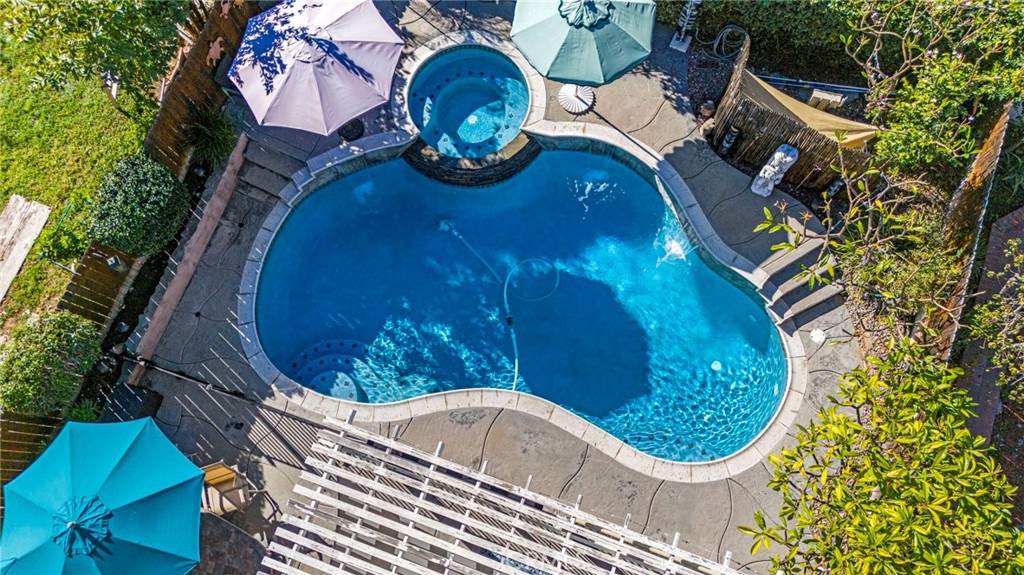 3670 Windstorm Way Riverside, CA 92503 - Photo 31 of 43 an aerial view of a house with a yard