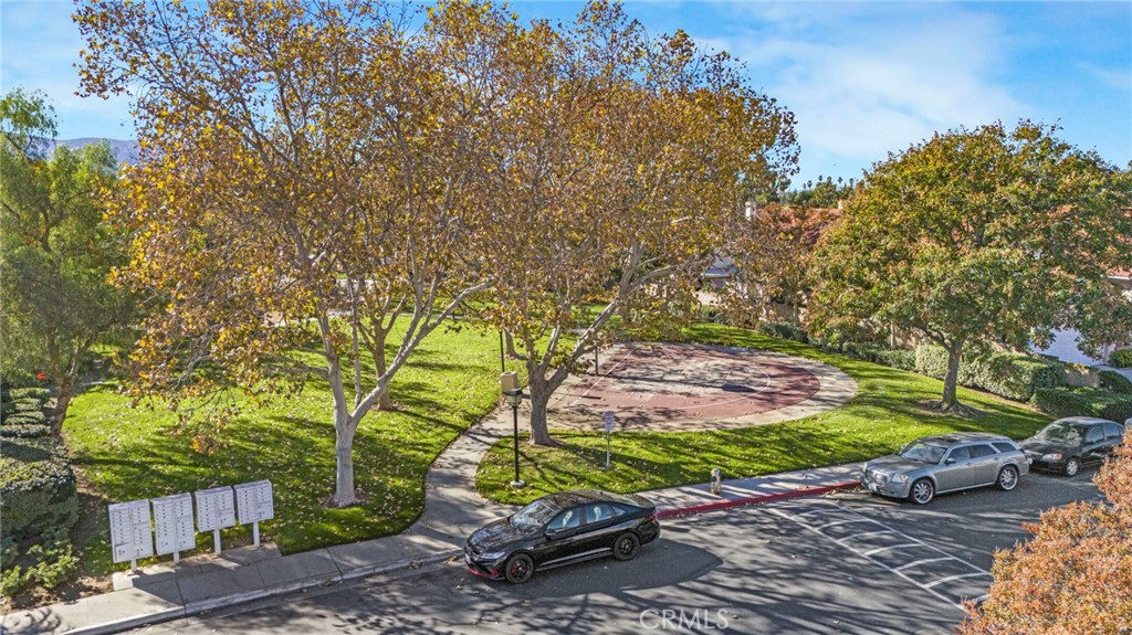 3670 Windstorm Way Riverside, CA 92503 - Photo 35 of 43 a view of an outdoor space and a yard
