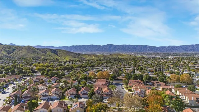 an aerial view of residential house and green space