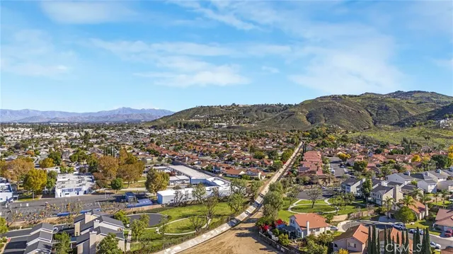 an aerial view of residential house and outdoor space