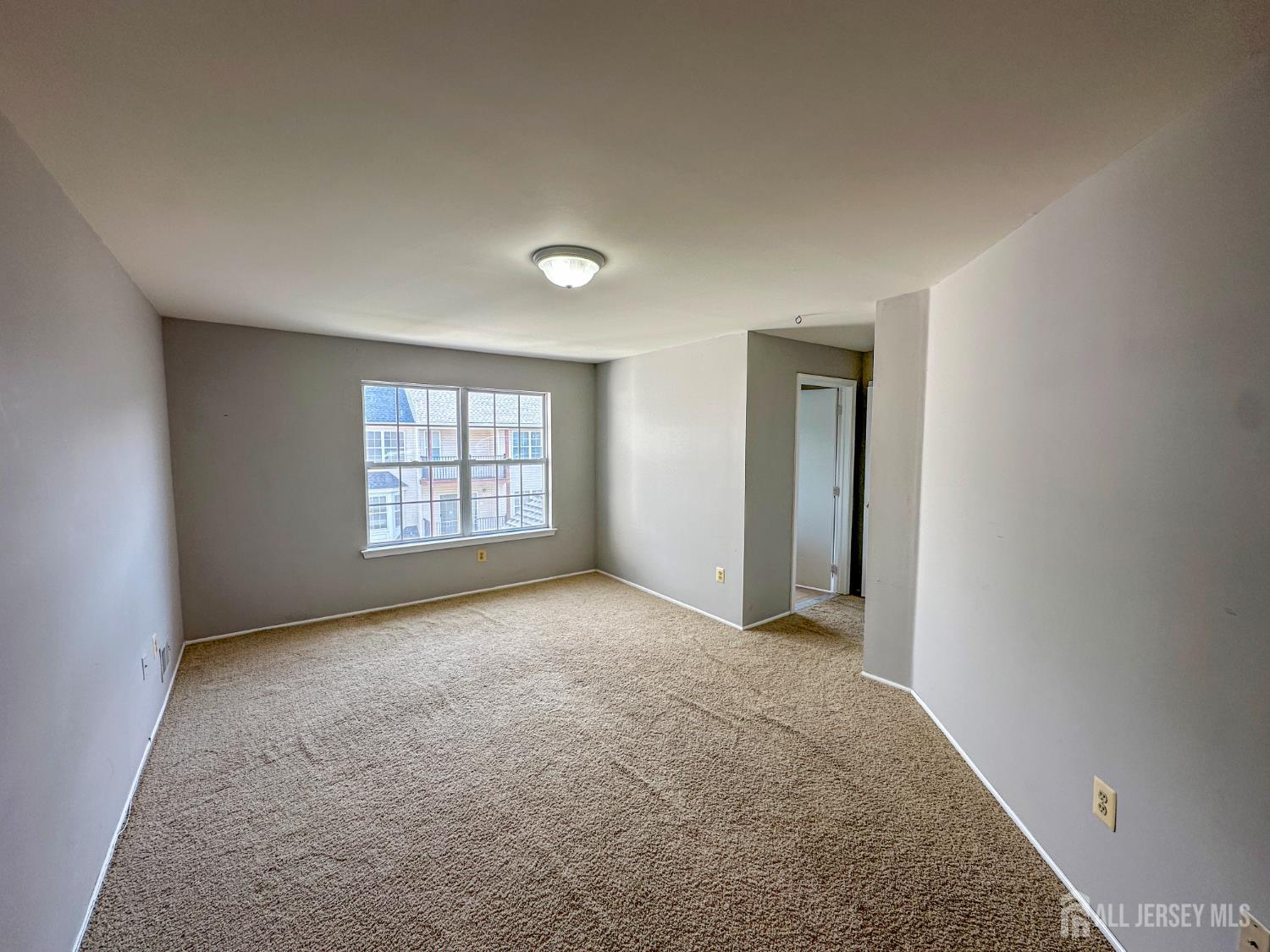 1212 Plymouth Road North Brunswick, NJ 08902 - Photo 21 of 27 an empty room with windows