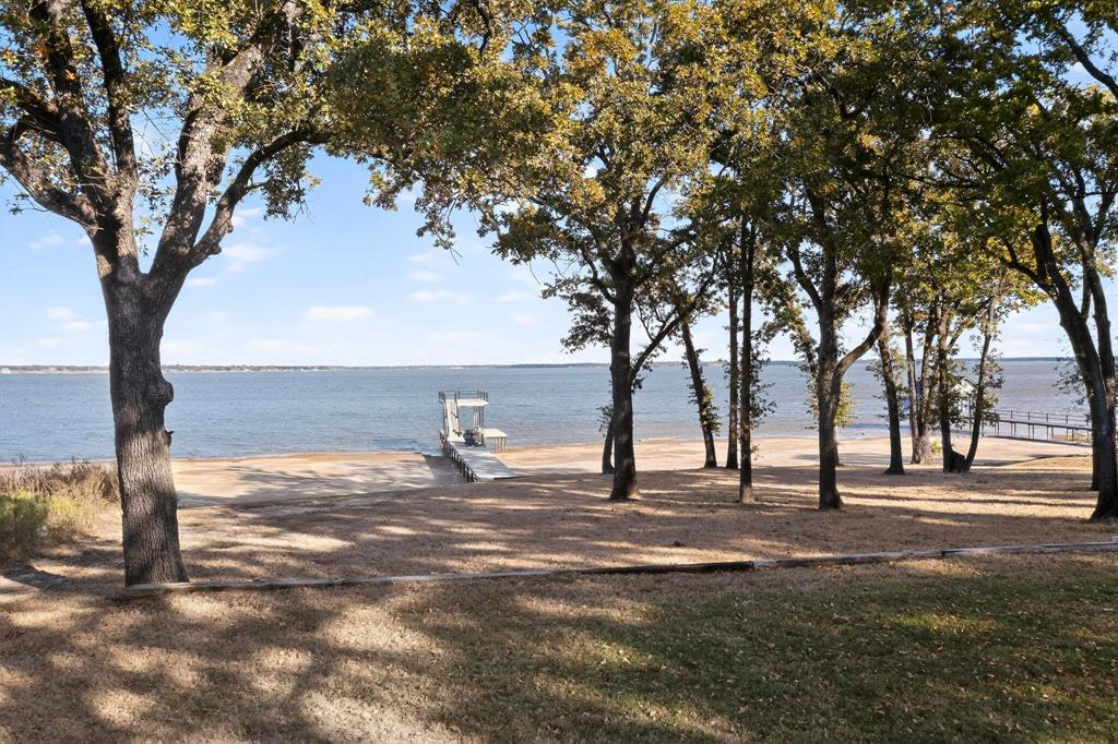 8839 Southern Shore Kemp, TX 75143 - Photo 33 of 40 a view of ocean with large trees
