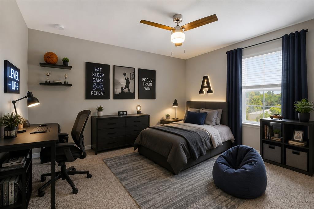 1192 Multiflora Loop Lutz, FL 33558 - Photo 25 of 32 a bedroom with a bed and a large window