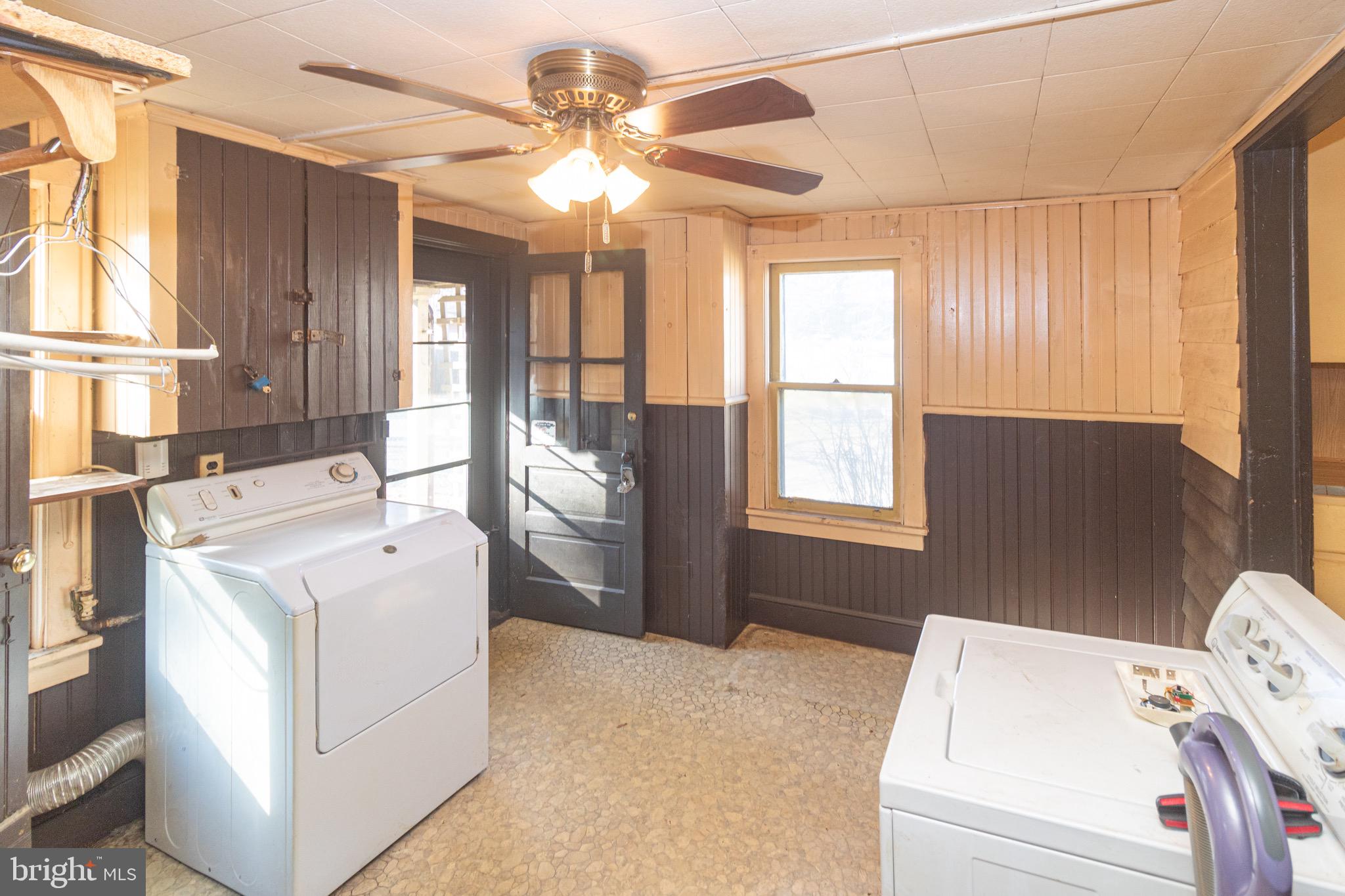 178 Mill Street Mount Holly, NJ 08060 - Photo 13 of 35 a room with a bed and a chandelier