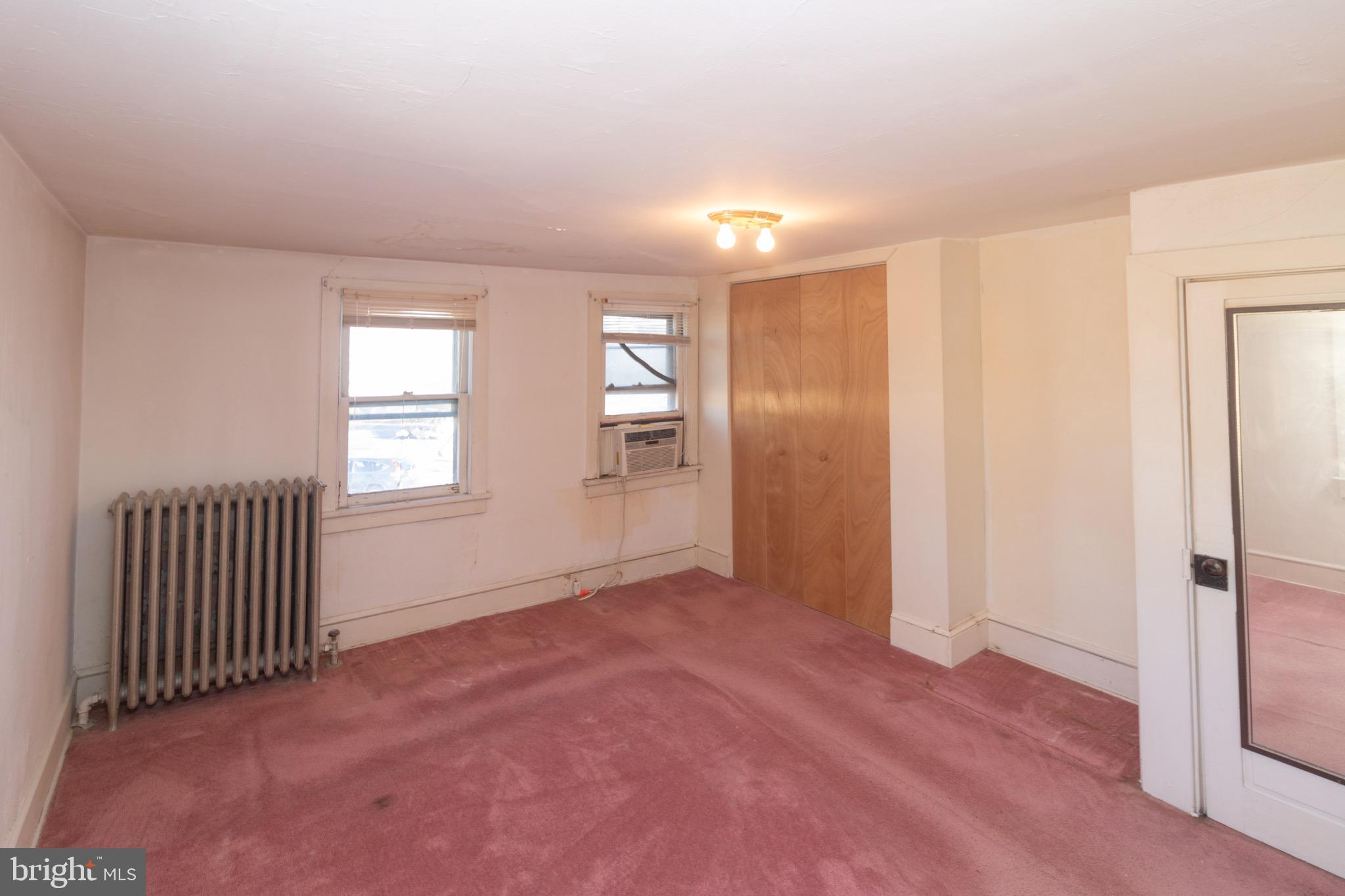178 Mill Street Mount Holly, NJ 08060 - Photo 15 of 35 an empty room with windows