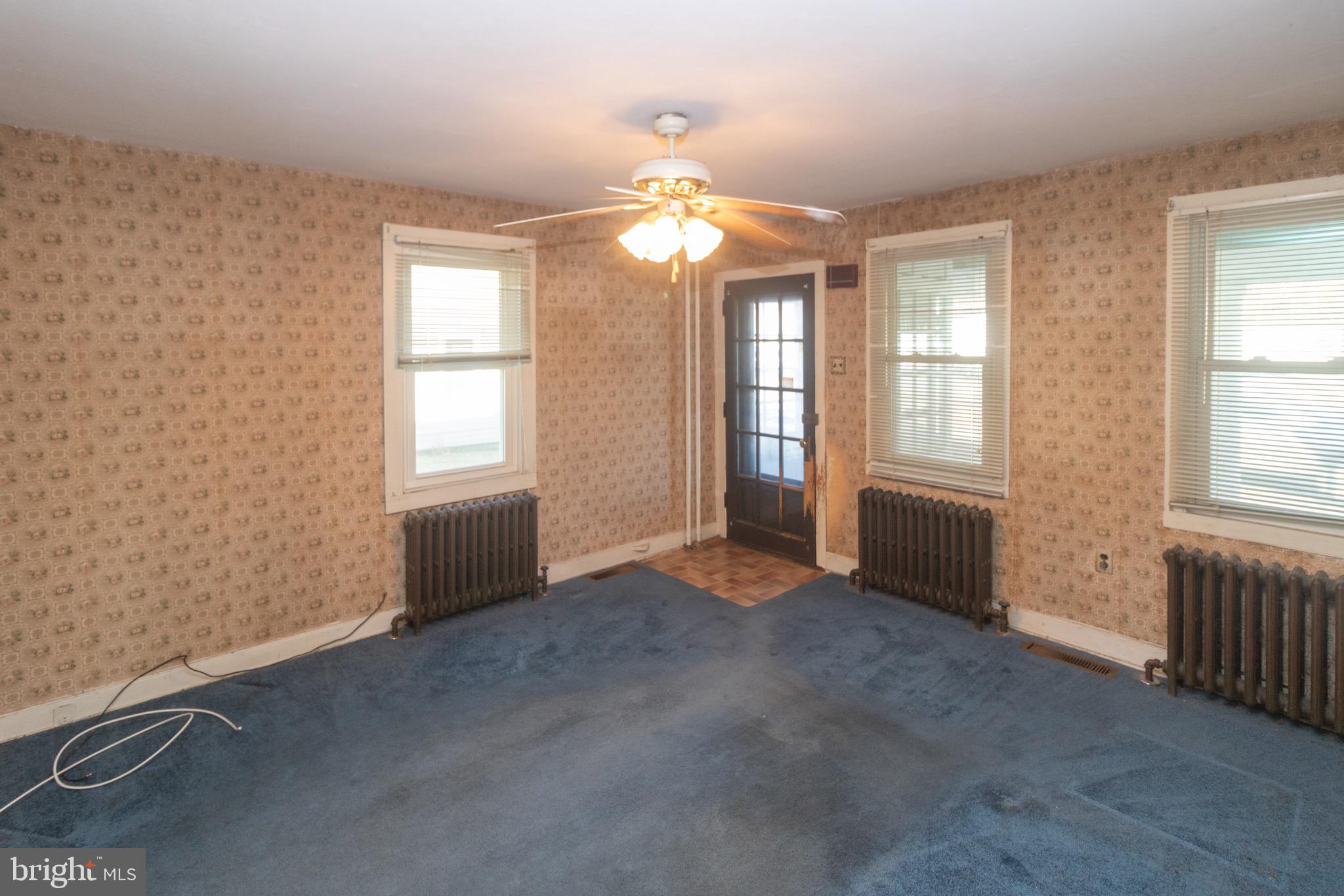 178 Mill Street Mount Holly, NJ 08060 - Photo 2 of 35 a view of an empty room with a window