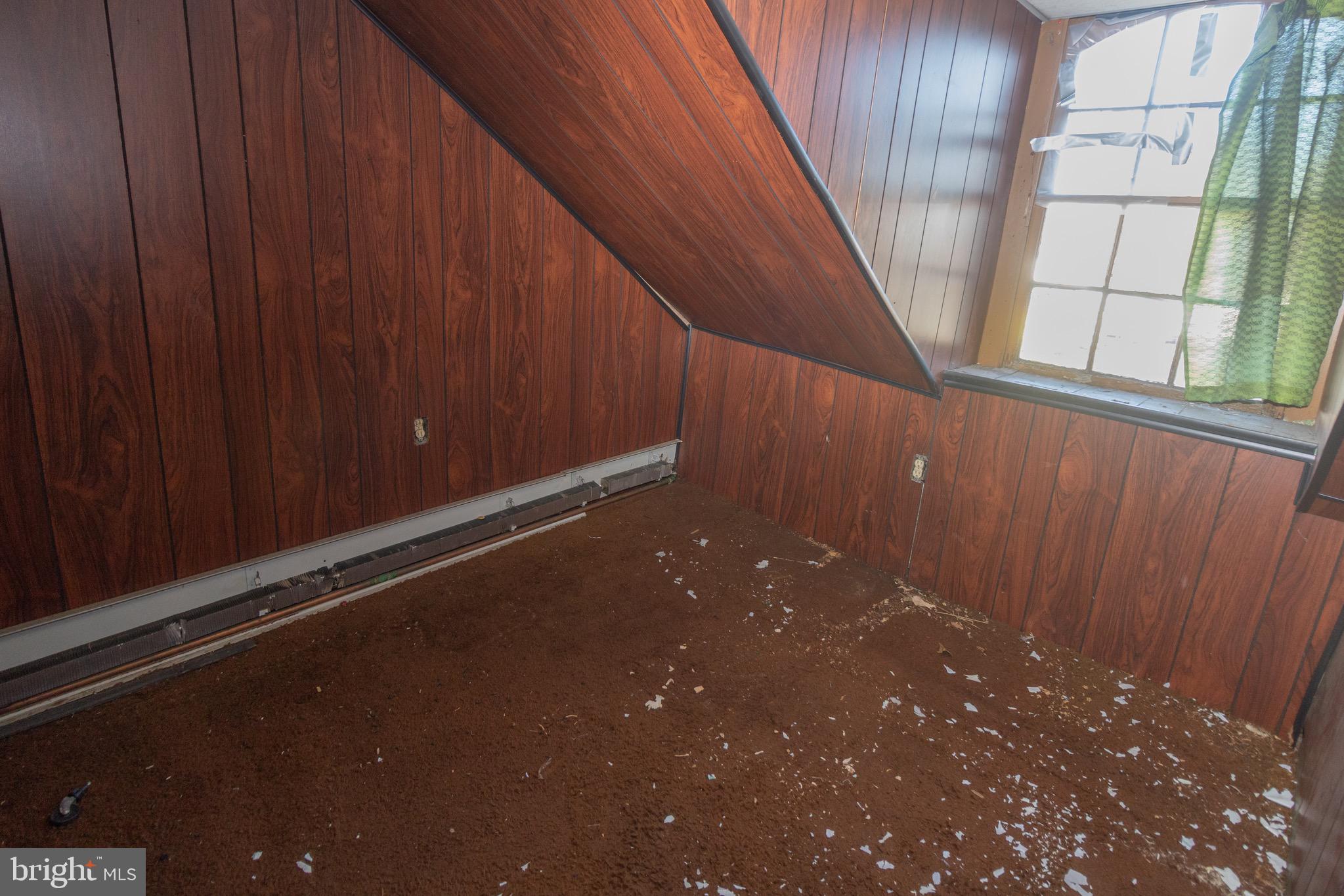 178 Mill Street Mount Holly, NJ 08060 - Photo 24 of 35 a view of an empty room with a window