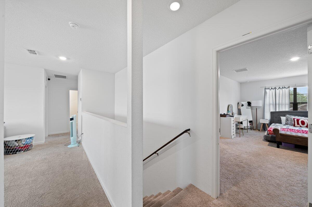 1652 Saxton Road Cocoa, FL 32926 - Photo 19 of 30 a living room with furniture and a flat screen tv