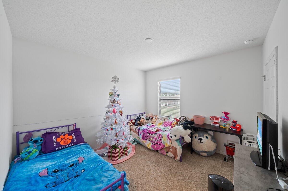 1652 Saxton Road Cocoa, FL 32926 - Photo 20 of 30 a play room with toys