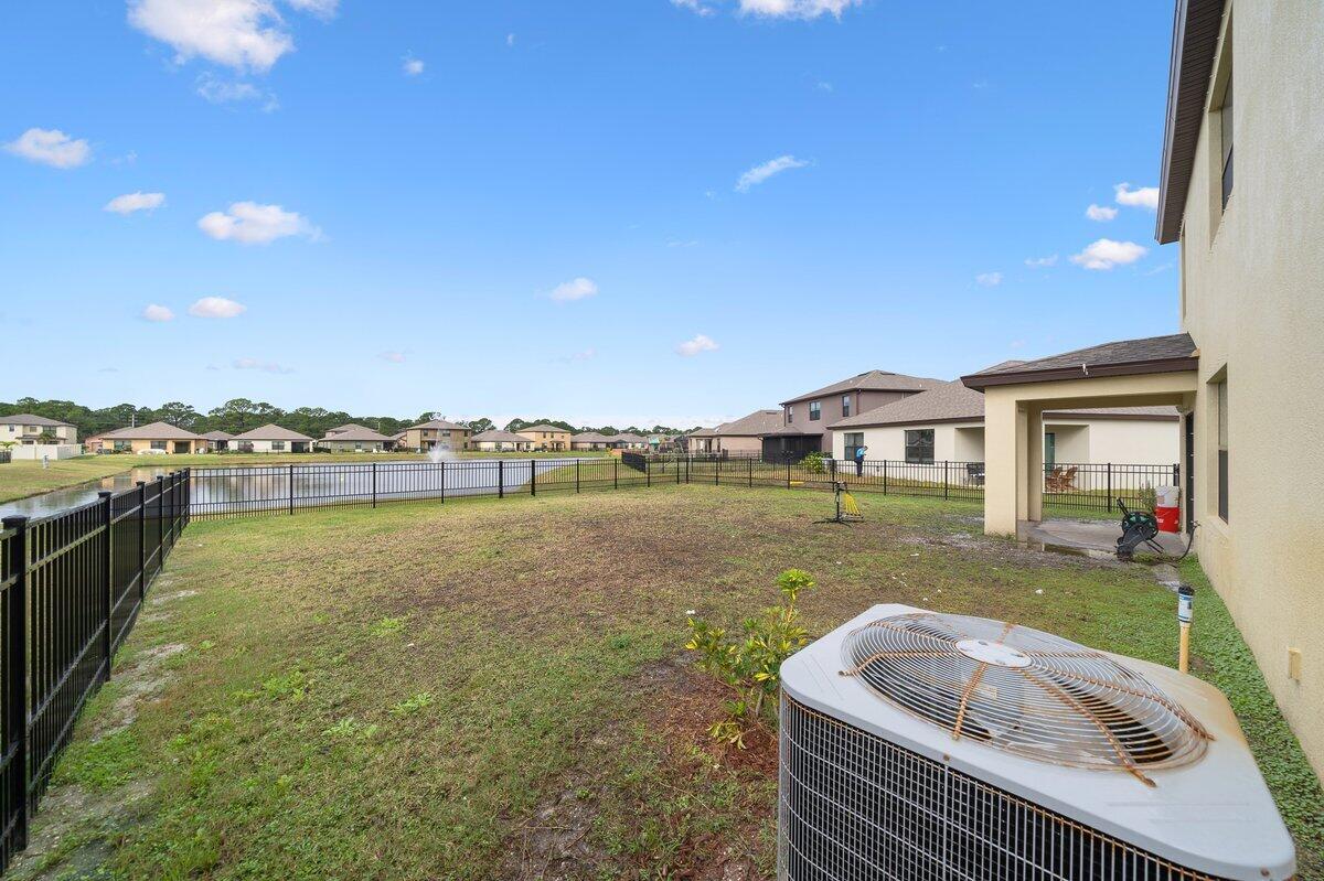 1652 Saxton Road Cocoa, FL 32926 - Photo 28 of 30 a view of a house with yard and patio