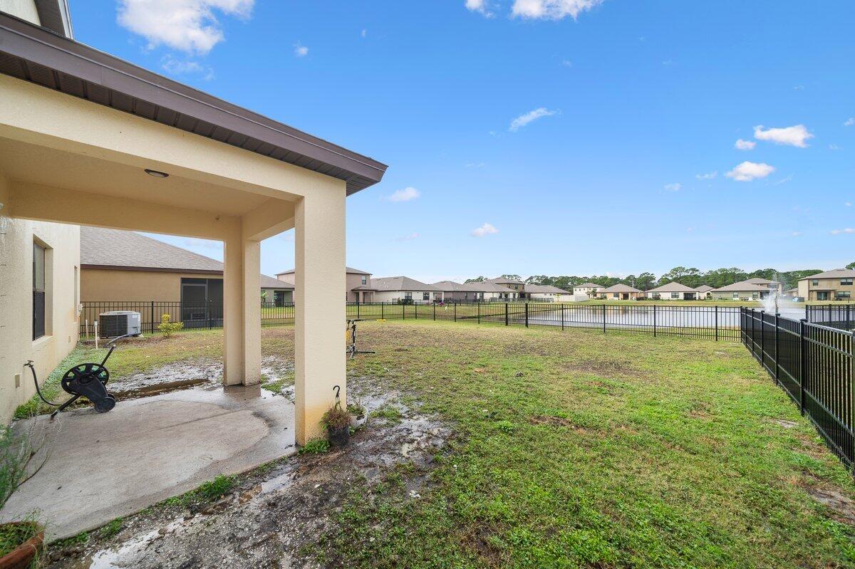 1652 Saxton Road Cocoa, FL 32926 - Photo 29 of 30 a swimming pool with outdoor seating and yard