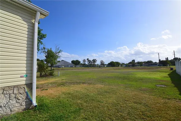a view of a lake with a houses