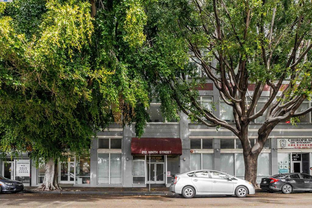 212 9th Street, Unit 208 Oakland, CA 94607 - Photo 13 of 13 a car parked in front of a building