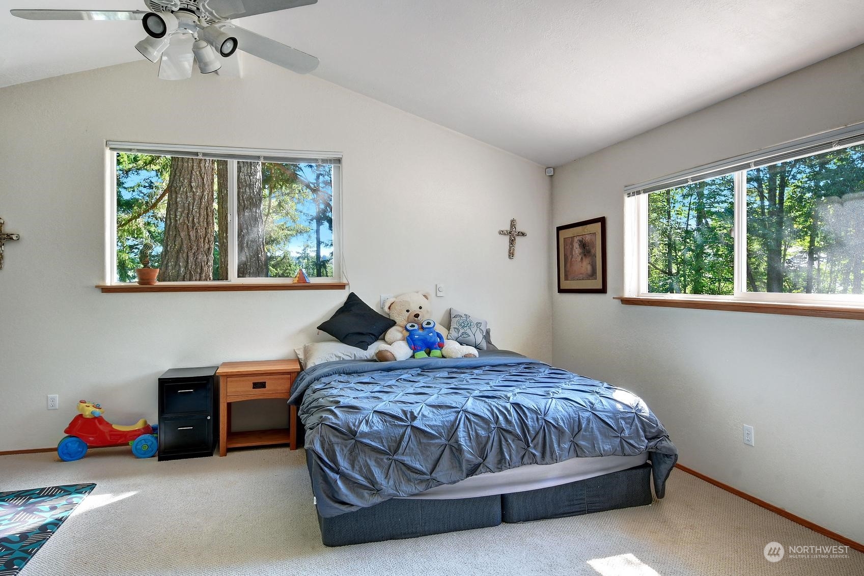 271 East Big Skookum Road Shelton, WA 98584 - Photo 20 of 24 a bedroom with a bed and a window