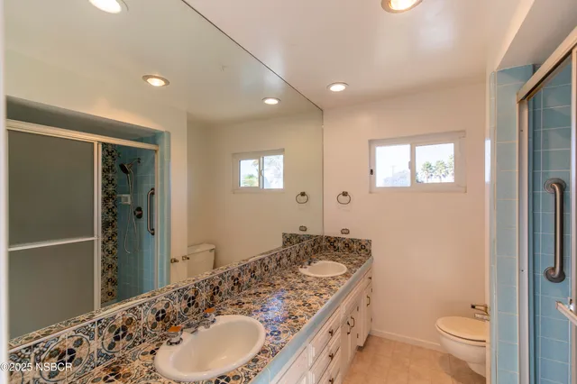 a view of a pathway of a house with wooden floor