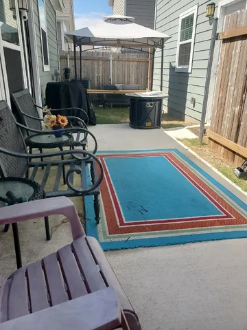 a view of swimming pool with chairs