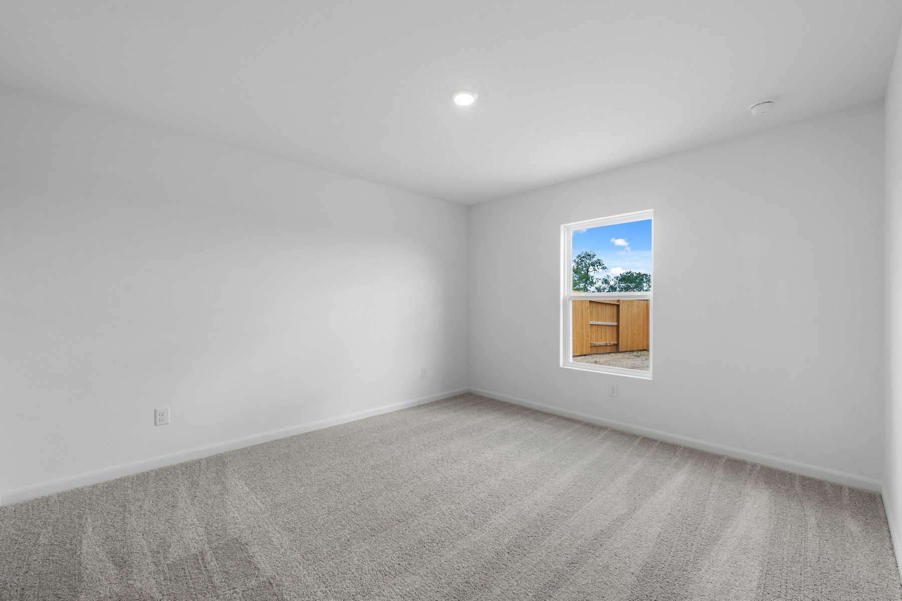 401 Silent Meadow Run Maxwell, TX 78656 - Photo 7 of 11 Carpeted empty room with baseboards