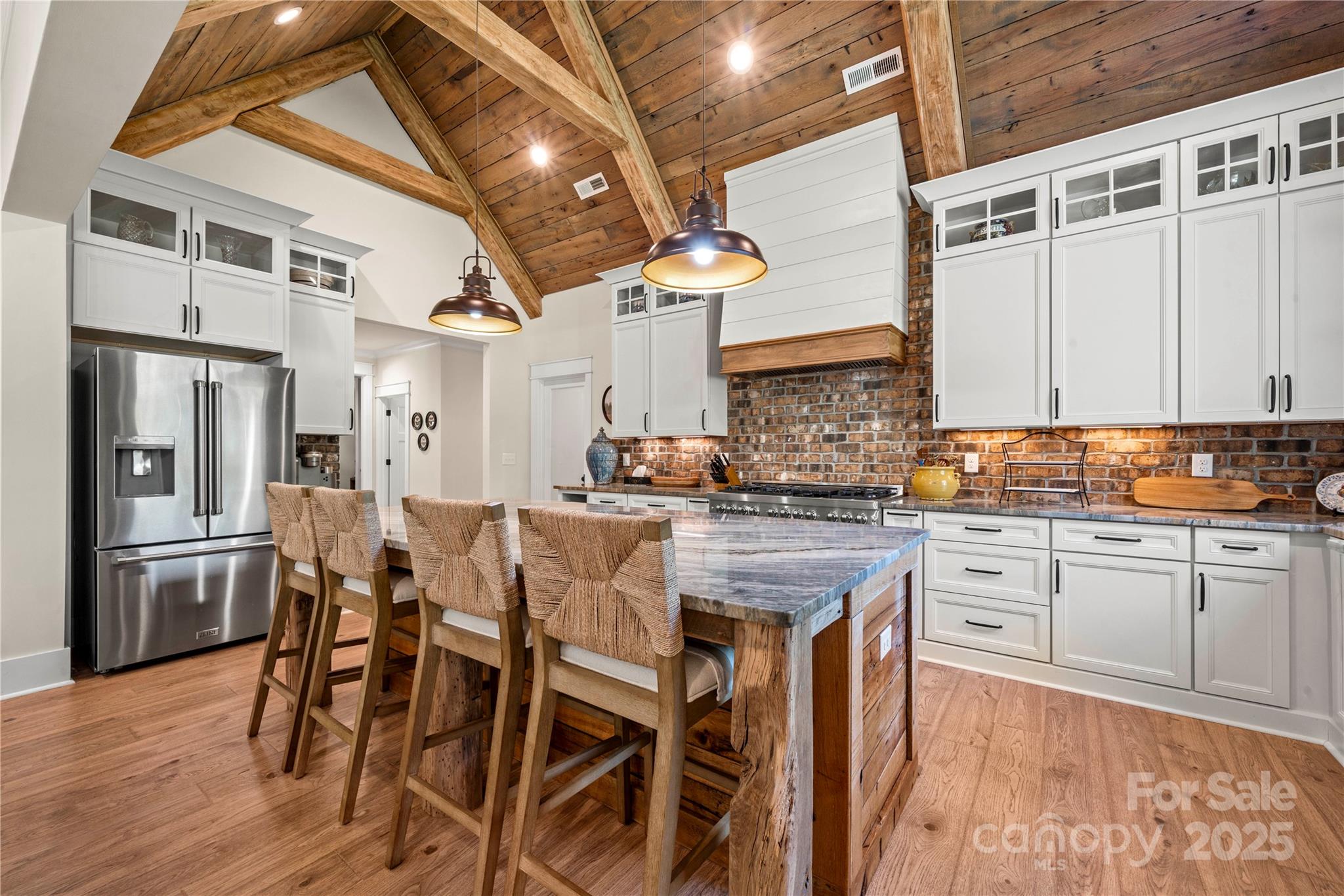 1033 Brandon Road Clover, SC 29710 - Photo 14 of 45 a kitchen with stainless steel appliances granite countertop a kitchen island hardwood floor and a sink