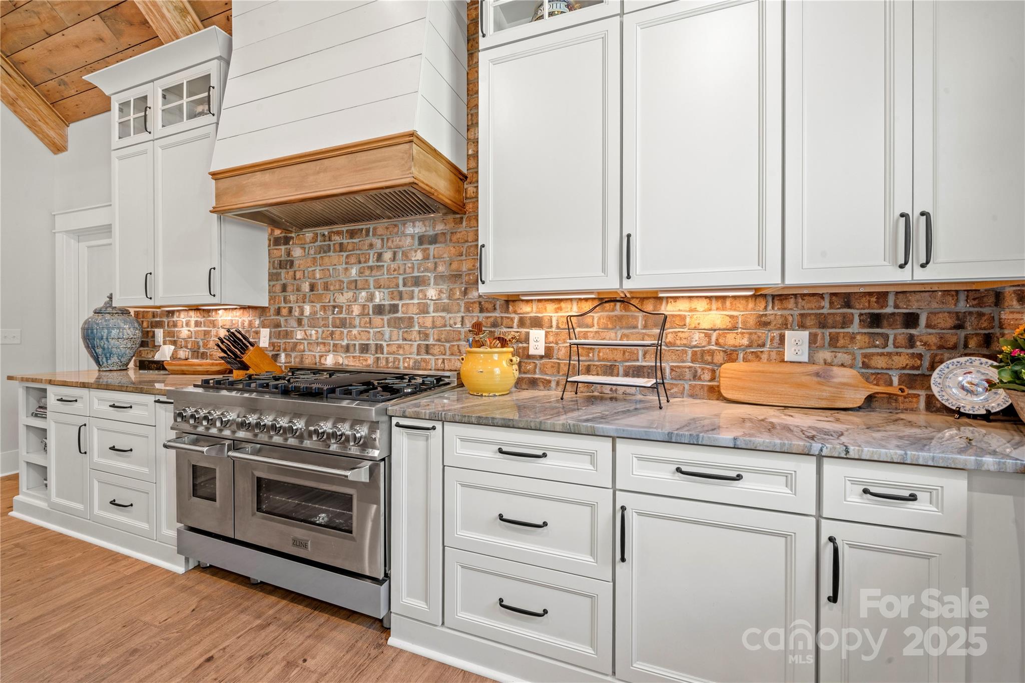 1033 Brandon Road Clover, SC 29710 - Photo 16 of 45 a kitchen with granite countertop white cabinets and white appliances