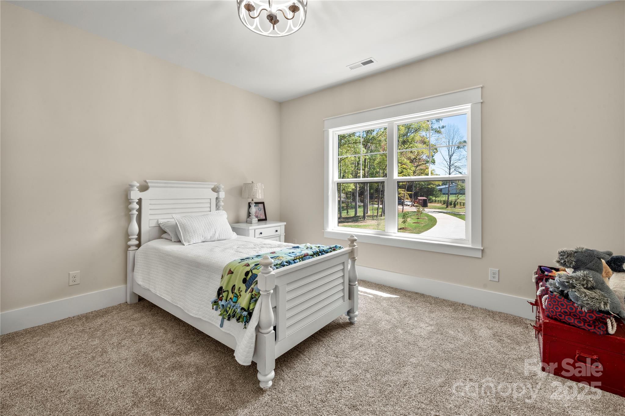 1033 Brandon Road Clover, SC 29710 - Photo 42 of 45 a bed sitting in a room next to a window