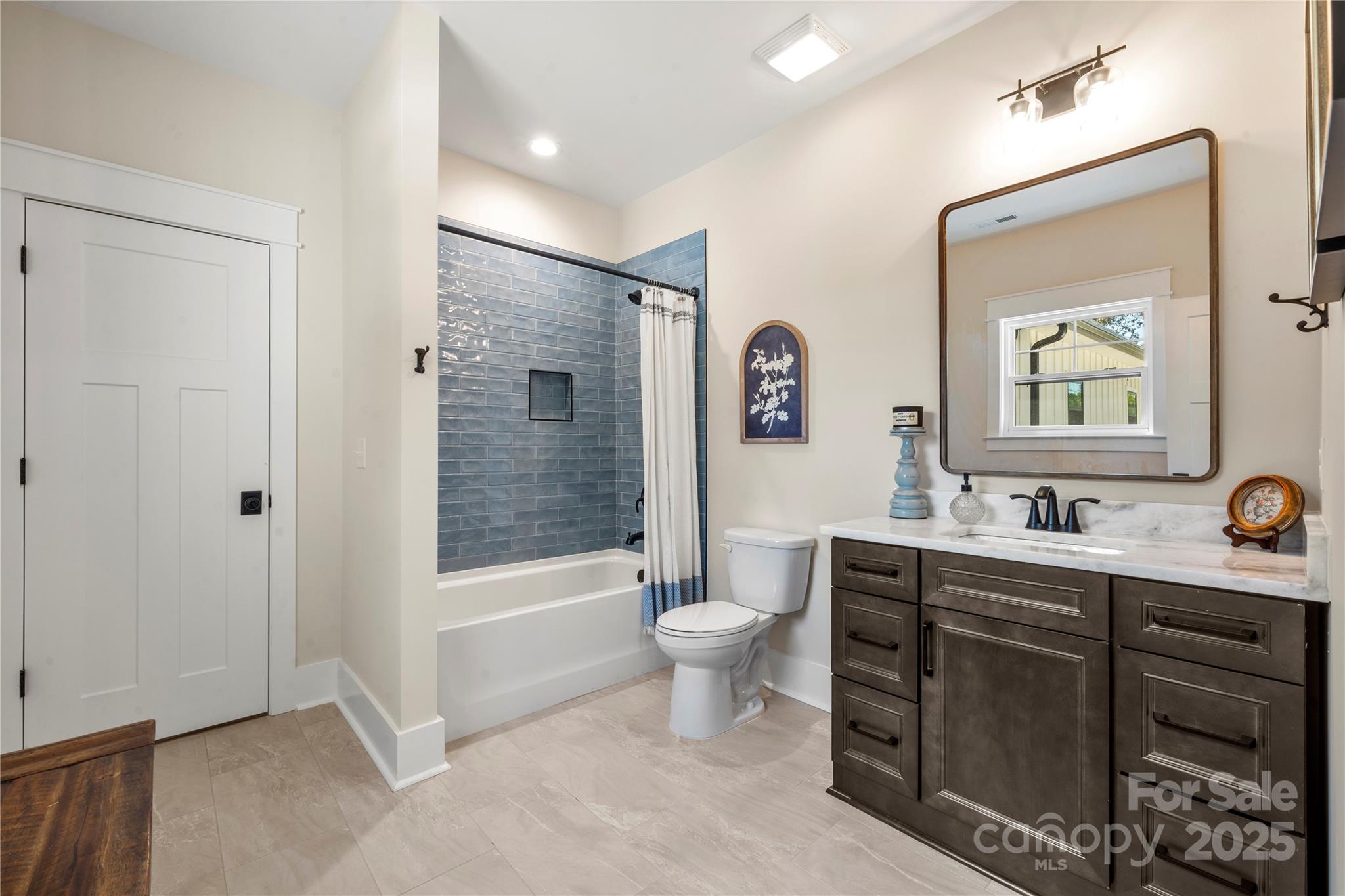 1033 Brandon Road Clover, SC 29710 - Photo 43 of 45 a bathroom with a sink a toilet and shower