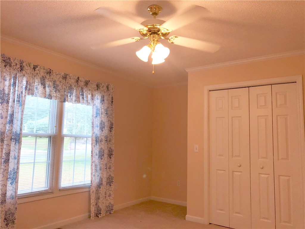 130 Holly Ridge Drive Anderson, SC 29621 - Photo 24 of 33 The front bedroom with ceiling fan.