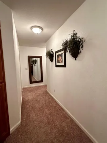 a workspace with furniture and window