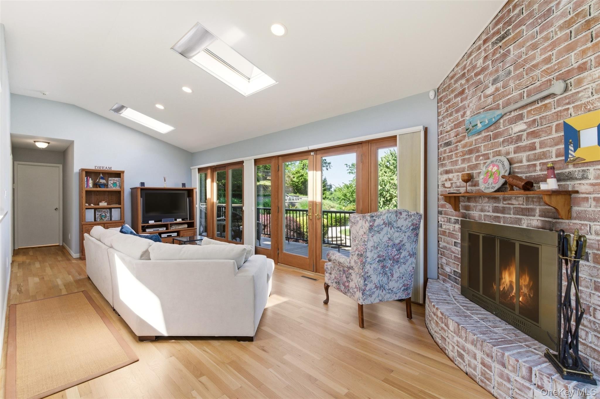 54 Westview Road Northport, NY 11768 - Photo 4 of 42 Spacious Living Room with Wood-Burning Fireplace