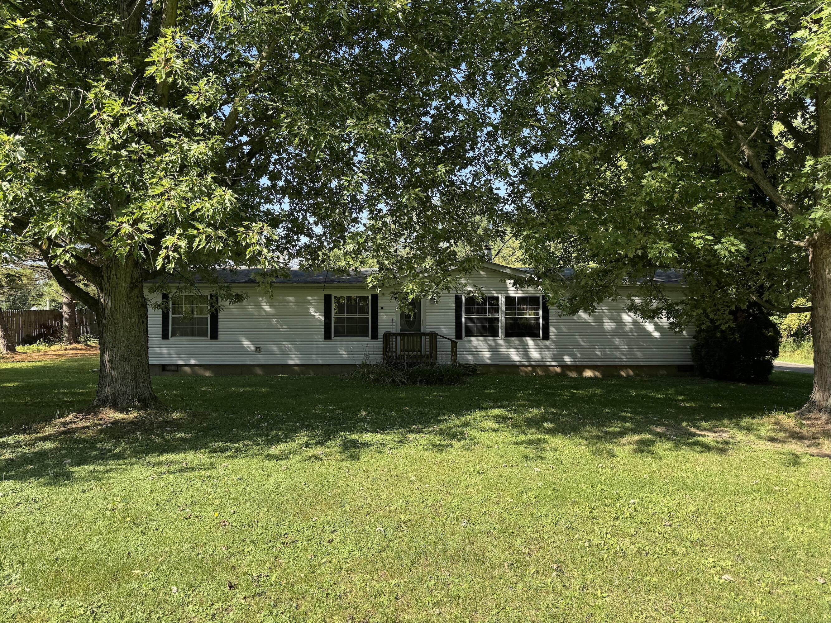 3152 North 50 West Valparaiso, IN 46385 - Photo 2 of 12 a front view of a house with garden
