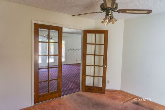 241 West Yellowstone Place Ridgecrest, CA 93555 - Photo 25 of 31 an empty room with windows