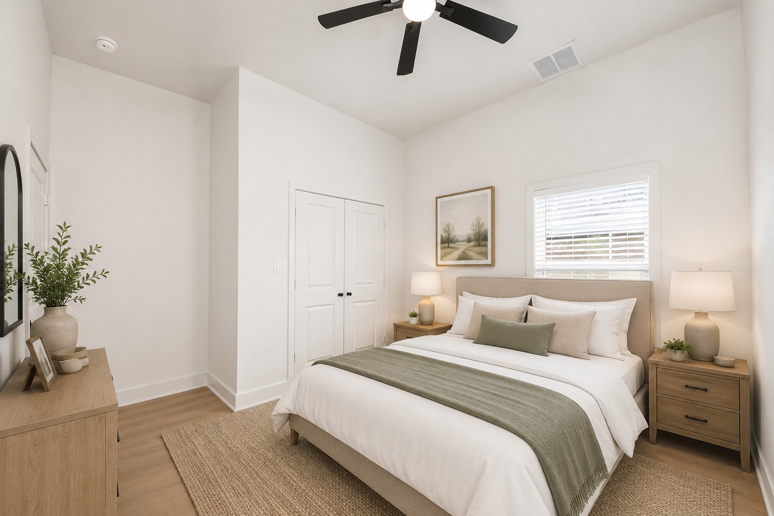 5226 Ricky Street Houston, TX 77033 - Photo 29 of 50 a bedroom with a bed and a potted plant